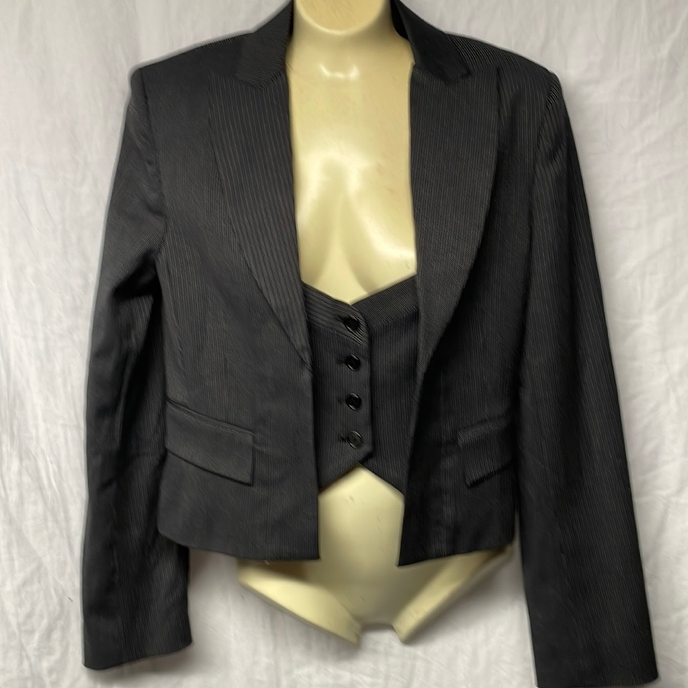 Ladies cropped jacket with attached vest.